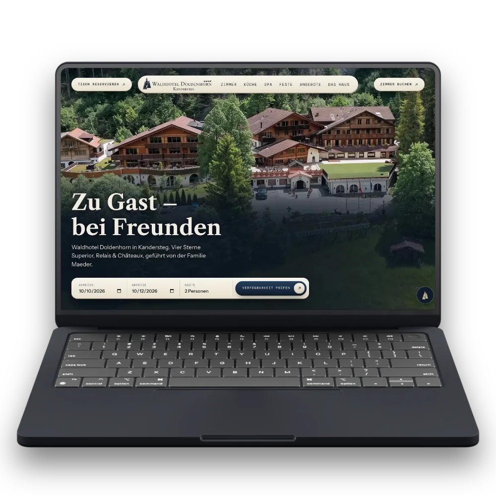Ein Laptop mit der neuen Startseite des Waldhotel Doldenhorn